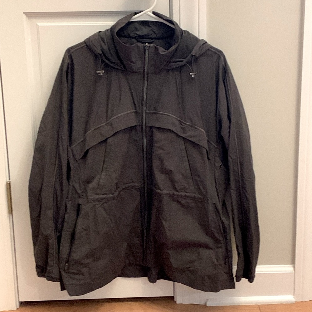 Athleta women’s lightweight jacket with hood.  Size M